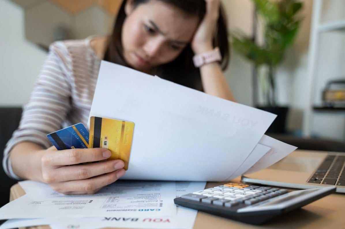 Woman reviewing credit to see how she can improve it