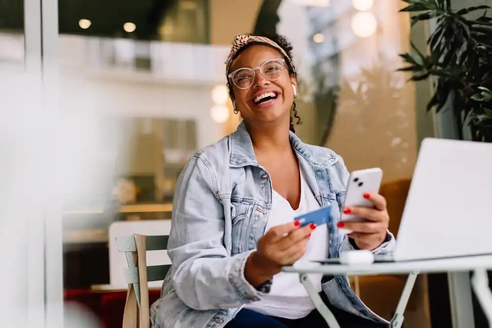 A woman checking her ACH funds online