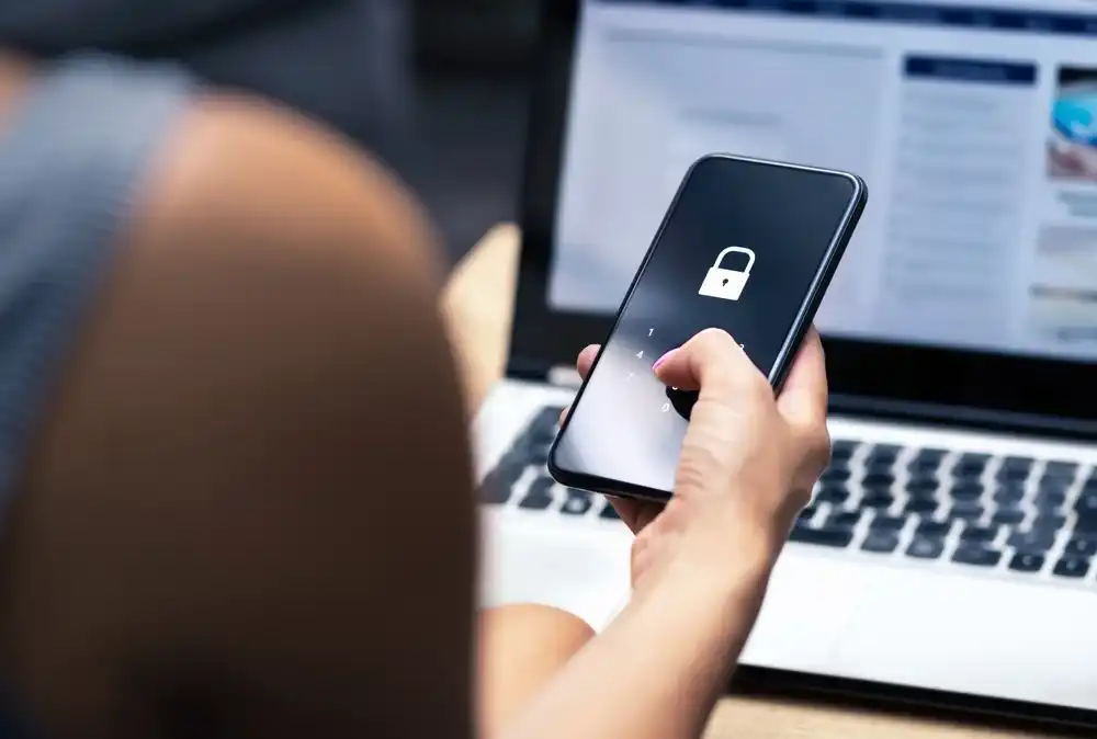 A woman unlocking her smartphone