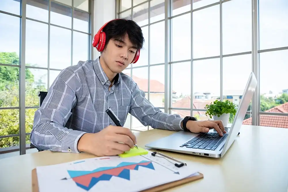 Man working on their financial literacy online