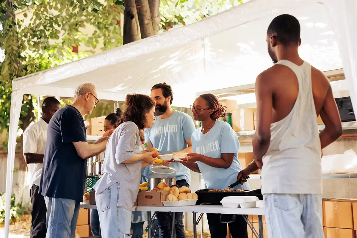 People giving out food at a foodbank in Texas